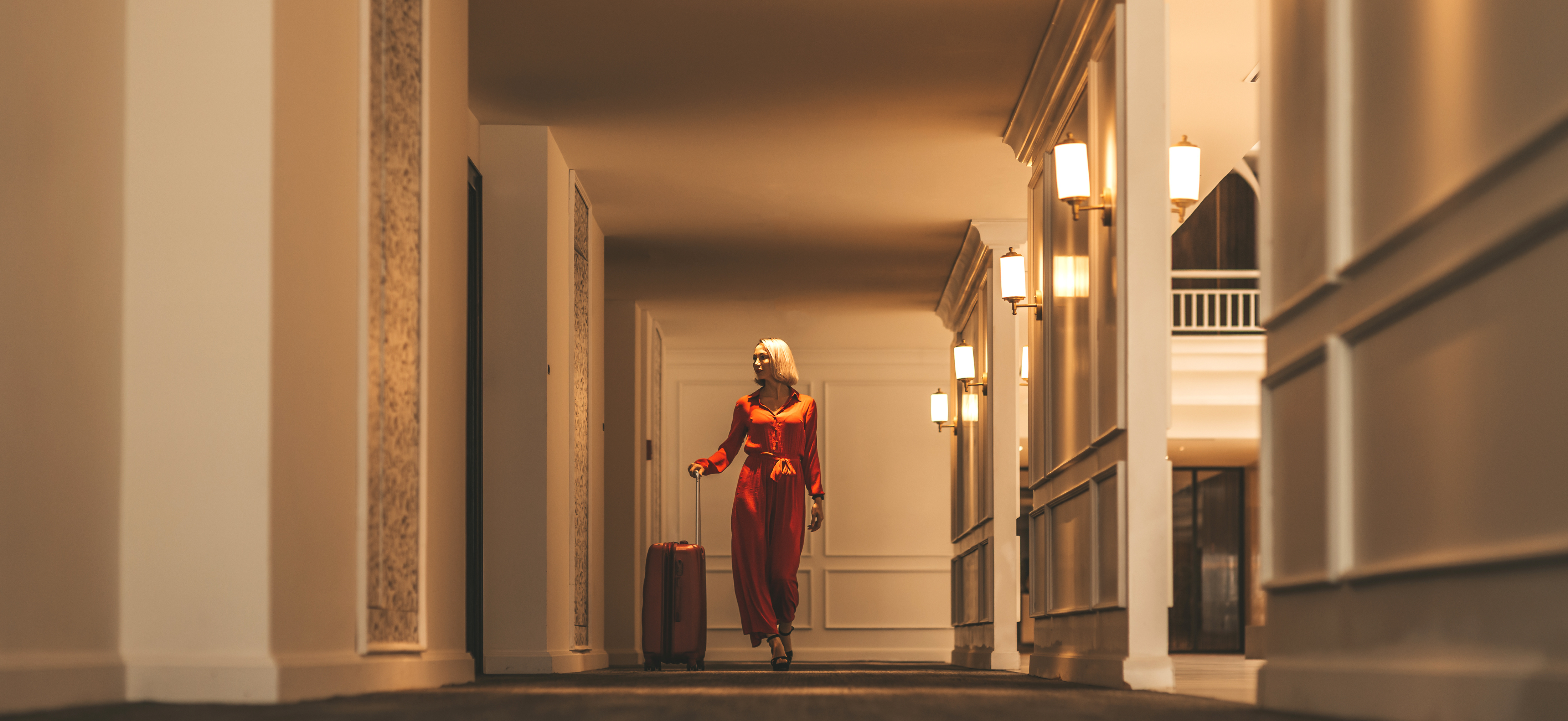 A luxury traveller arriving at an elegant hotel